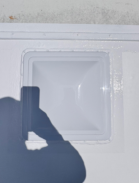 New roof vent installed and sealed on TPO membrane after replacement