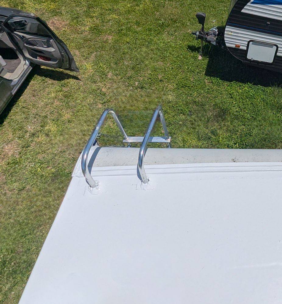 Restored RV roof and sealed ladder mounts after PVC roof replacement