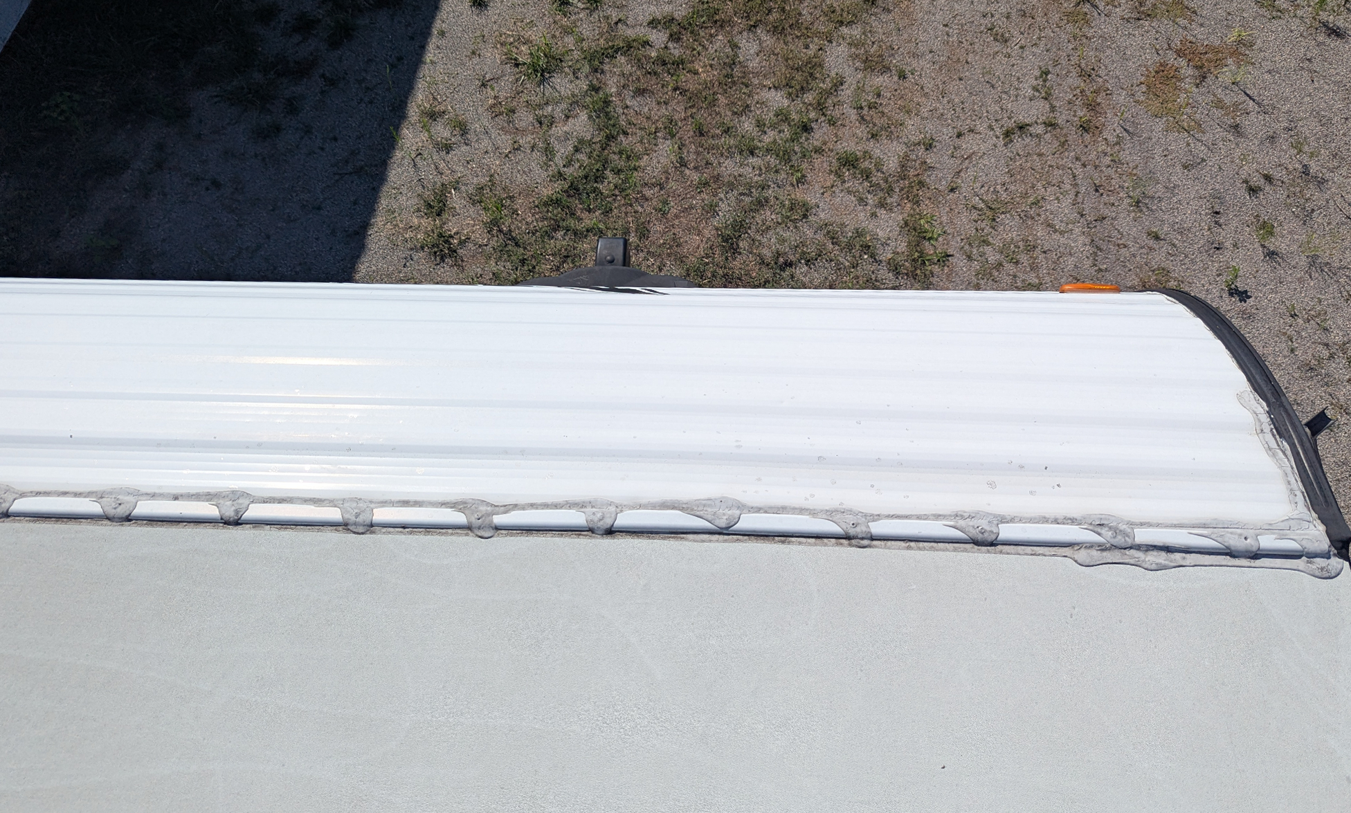 Termination bar before roof repair