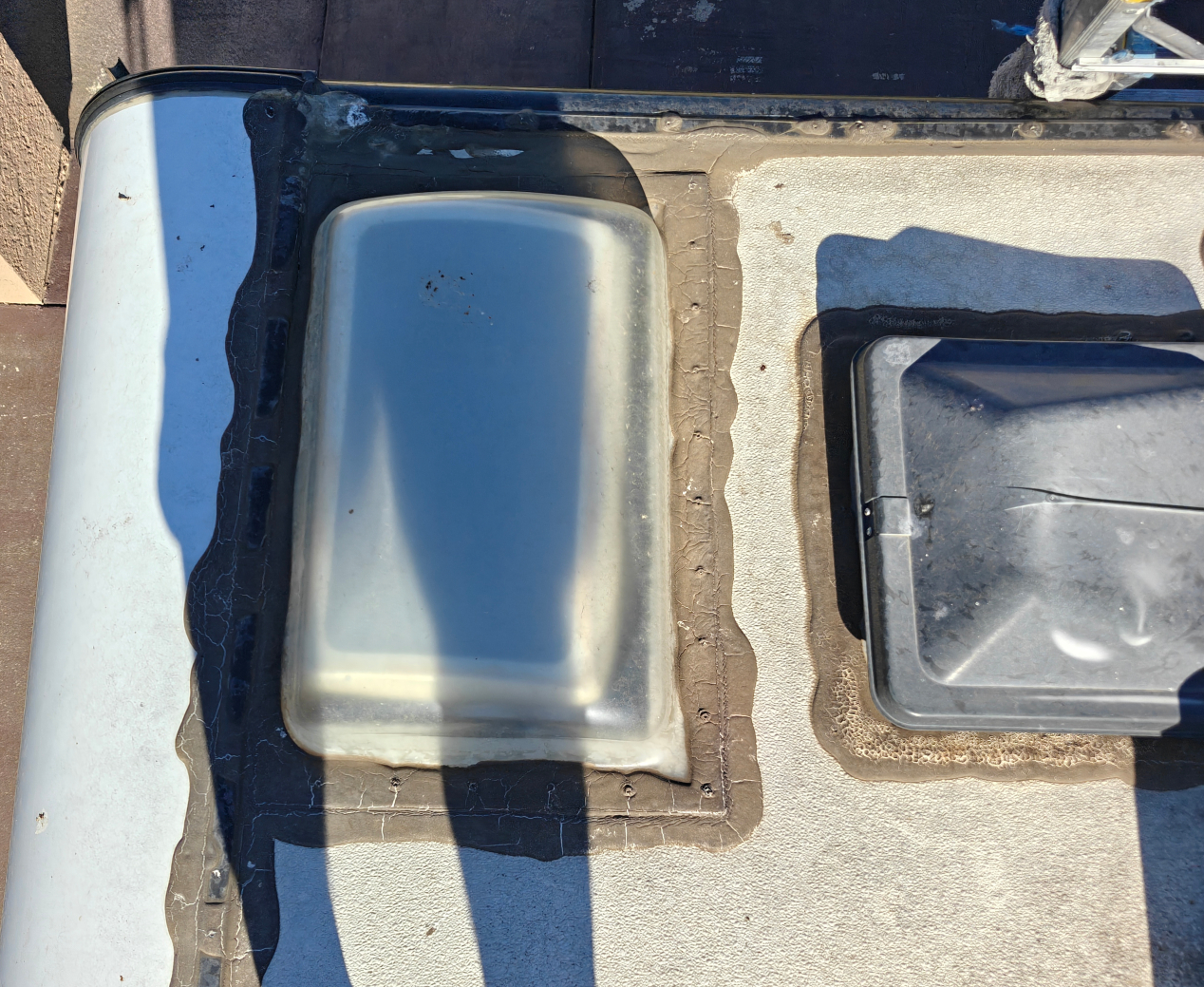 Skylight and roof vent before maintenance