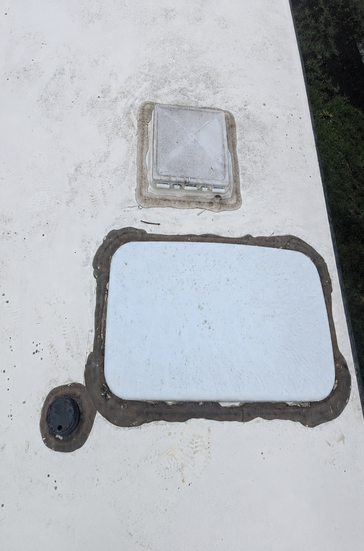 Skylight and vent before repair