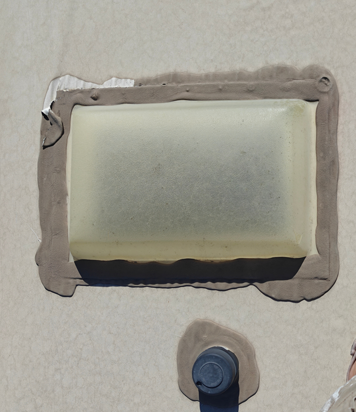 Skylight and plumbing vent before replacement