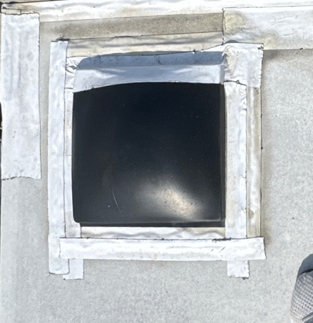 Old RV skylight with damaged sealant before replacement