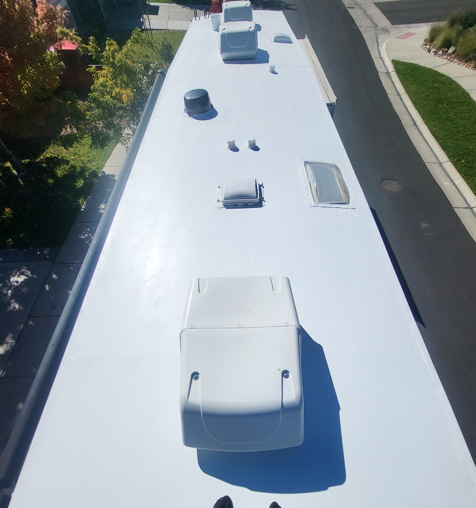 New RV roof with TPO membrane after replacement with clean and sealed surface