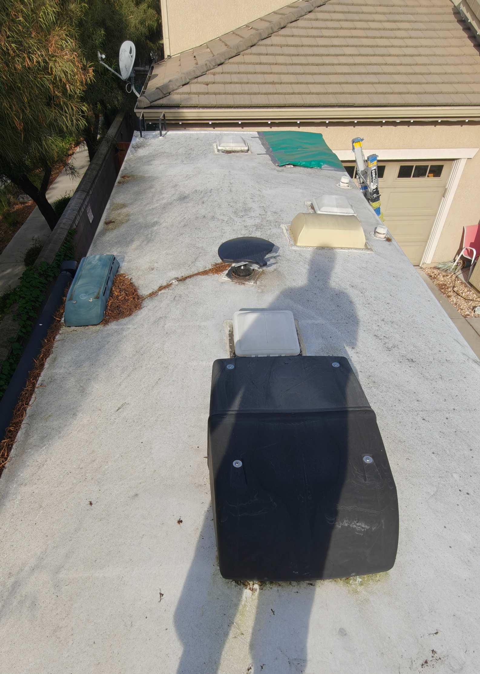 Worn and dirty RV roof before maintenance